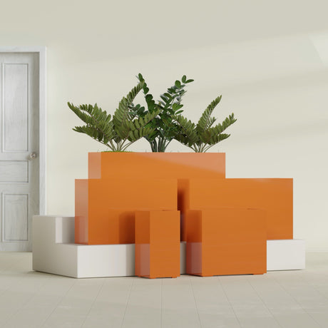 Potsdam Corner fiberglass planter in Gloss Tangerine, size range, in a sunlit interior