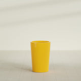 Tegel Round Tapered Planter in Gloss Saffron, 18"D × 26"H, shown empty