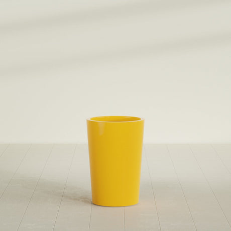 Tegel Round Tapered Planter in Gloss Saffron, 18"D × 26"H, shown empty