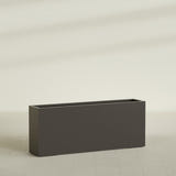 Hollywood Narrow Rectangular Planter in Matte Dark Brown, 60"L × 12"D × 24"H, shown empty