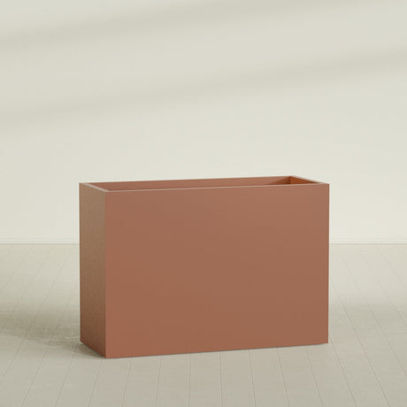 Darwin Rectangular Planter in Matte Terra Cotta, 60"L × 24"D × 42"H, shown empty