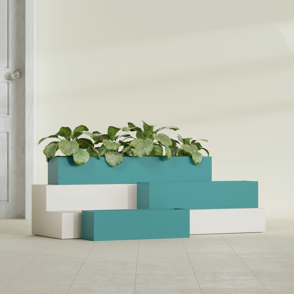 Monaco Rectangle fiberglass planter in Satin Seafoam Green, shown planted, in a sunlit interior