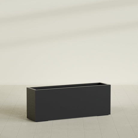 Miami Narrow Rectangular Planter in Matte Black, 48"L × 12"D × 18"H, shown empty