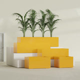 Torino Wide Rectangular fiberglass planter in Gloss Saffron, size range, in a sunlit interior