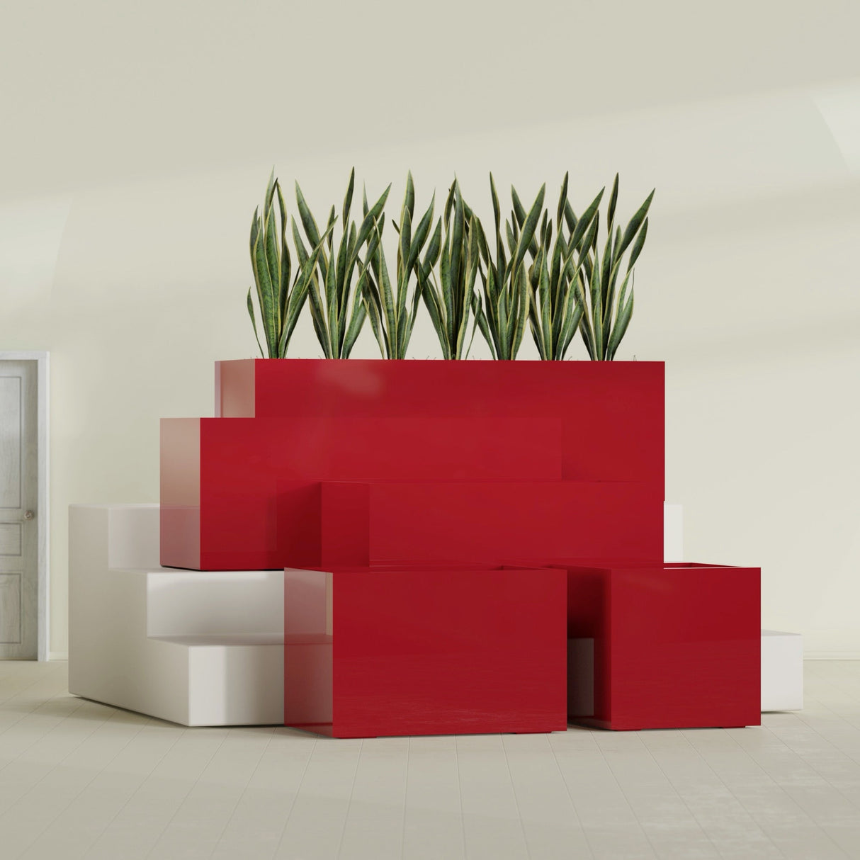 Granada fiberglass planter in Gloss Red, size range, in a sunlit interior