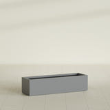 Cuba Low Rectangular Planter in Matte Gunmetal, 48"L × 14"D × 12"H, shown empty