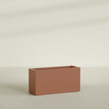 Miami Narrow Rectangular Planter in Matte Terra Cotta, 36"L × 12"D × 18"H, shown empty