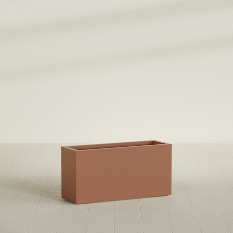 Miami Narrow Rectangular Planter in Matte Terra Cotta, 36"L × 12"D × 18"H, shown empty