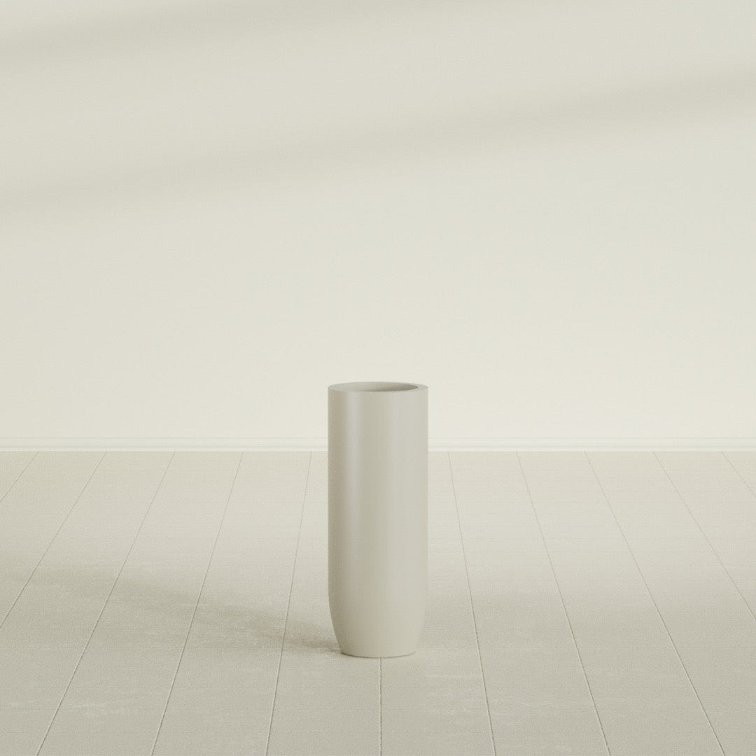 Saint Tropez Bullet Round Planter in Satin Beige, 12"D × 32"H, shown empty