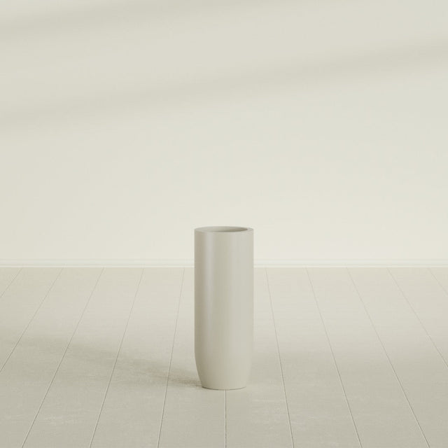 Saint Tropez Bullet Round Planter in Satin Beige, 12"D × 32"H, shown empty