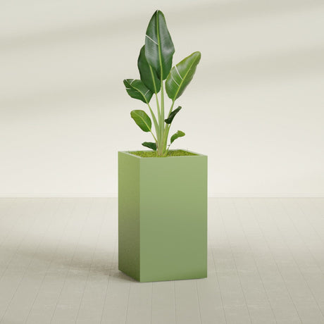 Darwin Rectangular fiberglass planter in Satin Green, shown planted, in a sunlit interior