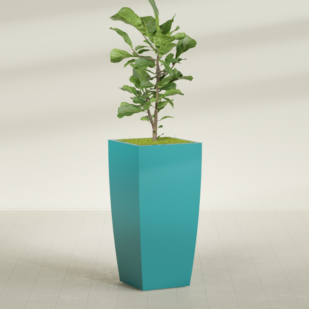 Toulan Tall Tapered Square fiberglass planter in Satin Seafoam Green, planted, in a sunlit interior