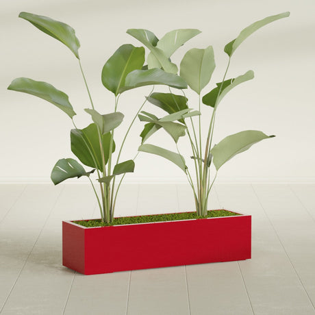 Cuba Corner fiberglass planter in Gloss Red, shown planted, in a sunlit interior