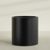 Rio Grande Cylinder Planter in Matte Black, 30"D × 32"H, shown empty