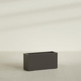 Hollywood Narrow Rectangular Planter in Matte Dark Brown, 36"L × 12"D × 24"H, shown empty