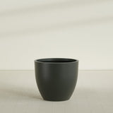 Wannsee Round Planter in Matte Charcoal, 44"D × 39"H, shown empty