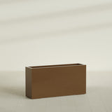 Hollywood Narrow Rectangular Planter in Metallic Bronze, 48"L × 12"D × 24"H, shown empty