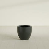Wannsee Round Planter in Matte Charcoal, 27"D × 24"H, shown empty