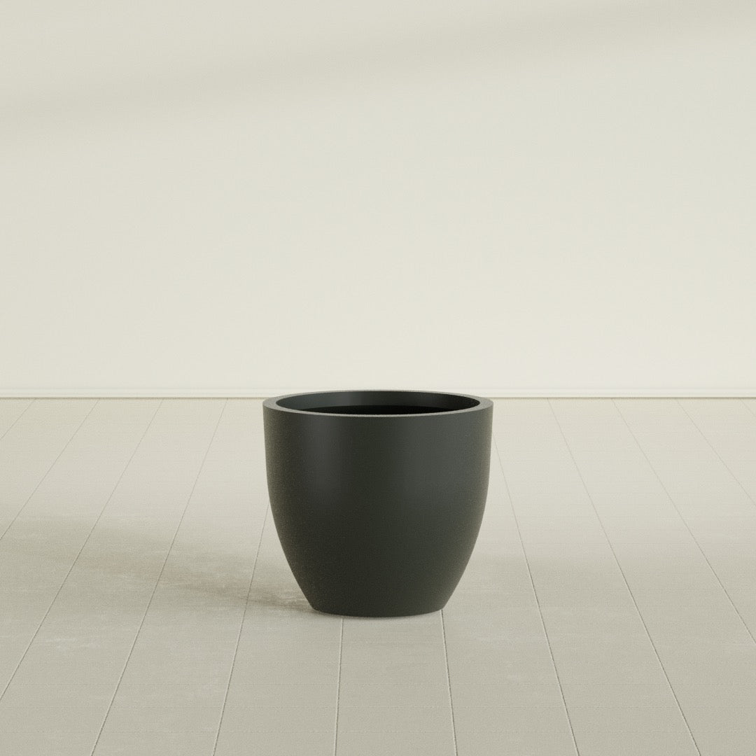 Wannsee Round Planter in Matte Charcoal, 27"D × 24"H, shown empty