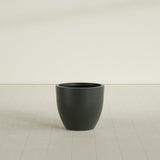 Wannsee Round Planter in Matte Charcoal, 27"D × 24"H, shown empty