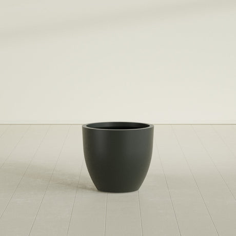 Wannsee Round Planter in Matte Charcoal, 27"D × 24"H, shown empty