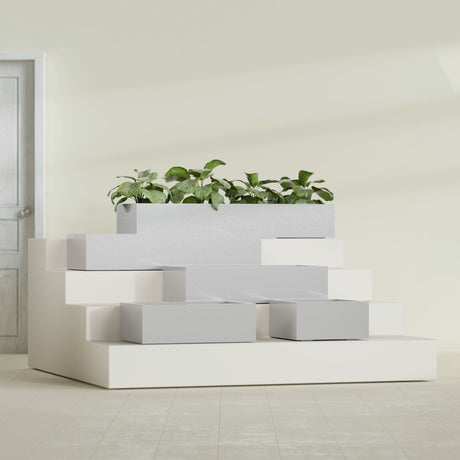 Antwerp Rectangular fiberglass planter in Metallic Silver, size range, in a sunlit interior