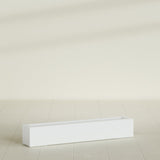 Salon Box Planter in Matte Bright White, 48" Long, shown empty