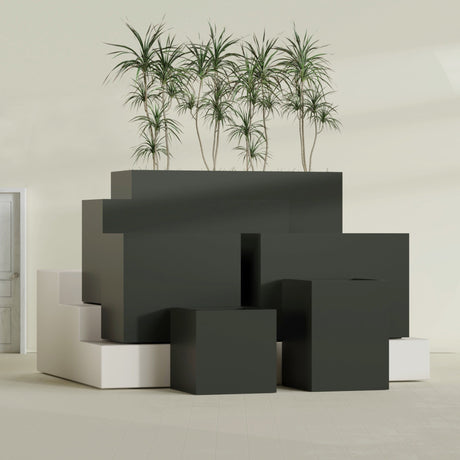 Brisbane Corner fiberglass planter in Matte Charcoal, size range, in a sunlit interior