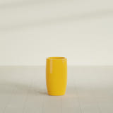 Lisbon tall round tapered fiberglass planter in Gloss Saffron, 14 in diameter, 25 in high, shown empty