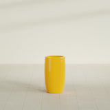 Lisbon tall round tapered fiberglass planter in Gloss Saffron, 14 in diameter, 25 in high, shown empty