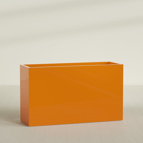 Darwin Rectangular Planter in Gloss Tangerine, 72"L × 24"D × 42"H, shown empty