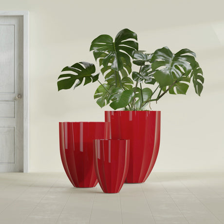 Alicante Fluted fiberglass planter in Gloss Red, size range, in a sunlit interior