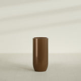 Saint Tropez Bullet Round Planter in Metallic Bronze, 24"D × 50"H, shown empty