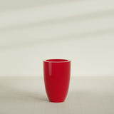 Brannan Tapered Round Planter in Gloss Red, 24"D × 35"H, shown empty