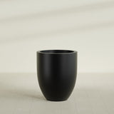 Valencia Tapered Round Planter in Matte Black, 27"D × 31"H, shown empty