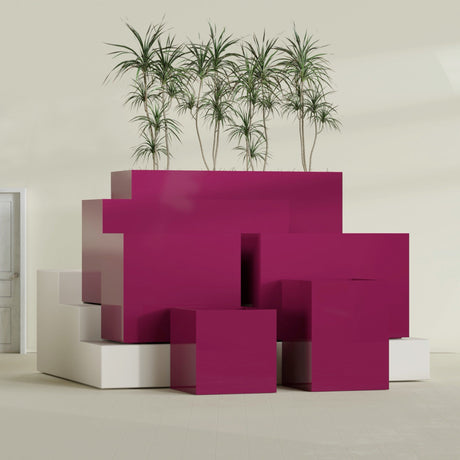 Brisbane Corner fiberglass planter in Gloss Eggplant, size range, in a sunlit interior