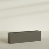 Miami Narrow Rectangular Planter in Matte Bronze, 60"L × 12"D × 18"H, shown empty