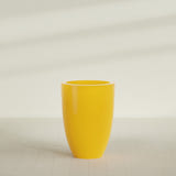 Brannan Tapered Round Planter in Gloss Saffron, 30"D × 41"H, shown empty