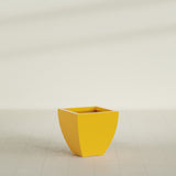 Lima Tapered Square Planter in Gloss Saffron, 20", shown empty