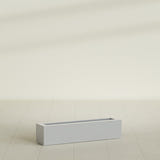 Salon Box Planter in Metallic Silver, 36" Long, shown empty