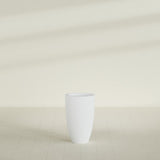 Brannan Tapered Round Planter in Gloss Bright White, 18"D × 29"H, shown empty