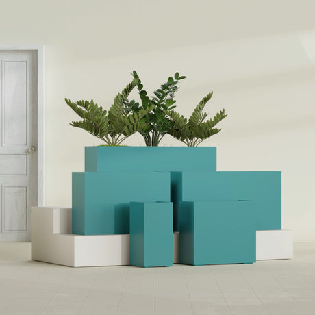 Potsdam Corner fiberglass planter in Satin Seafoam Green, size range, in a sunlit interior