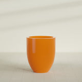 Valencia Tapered Round Planter in Gloss Tangerine, 27"D × 31"H, shown empty
