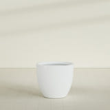 Wannsee Round Planter in Matte Bright White, 39"D × 34"H, shown empty