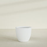 Wannsee Round Planter in Matte Bright White, 39"D × 34"H, shown empty