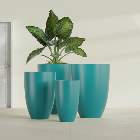 Brannan Tapered Round fiberglass planter in Satin Seafoam Green, size range, in a sunlit interior