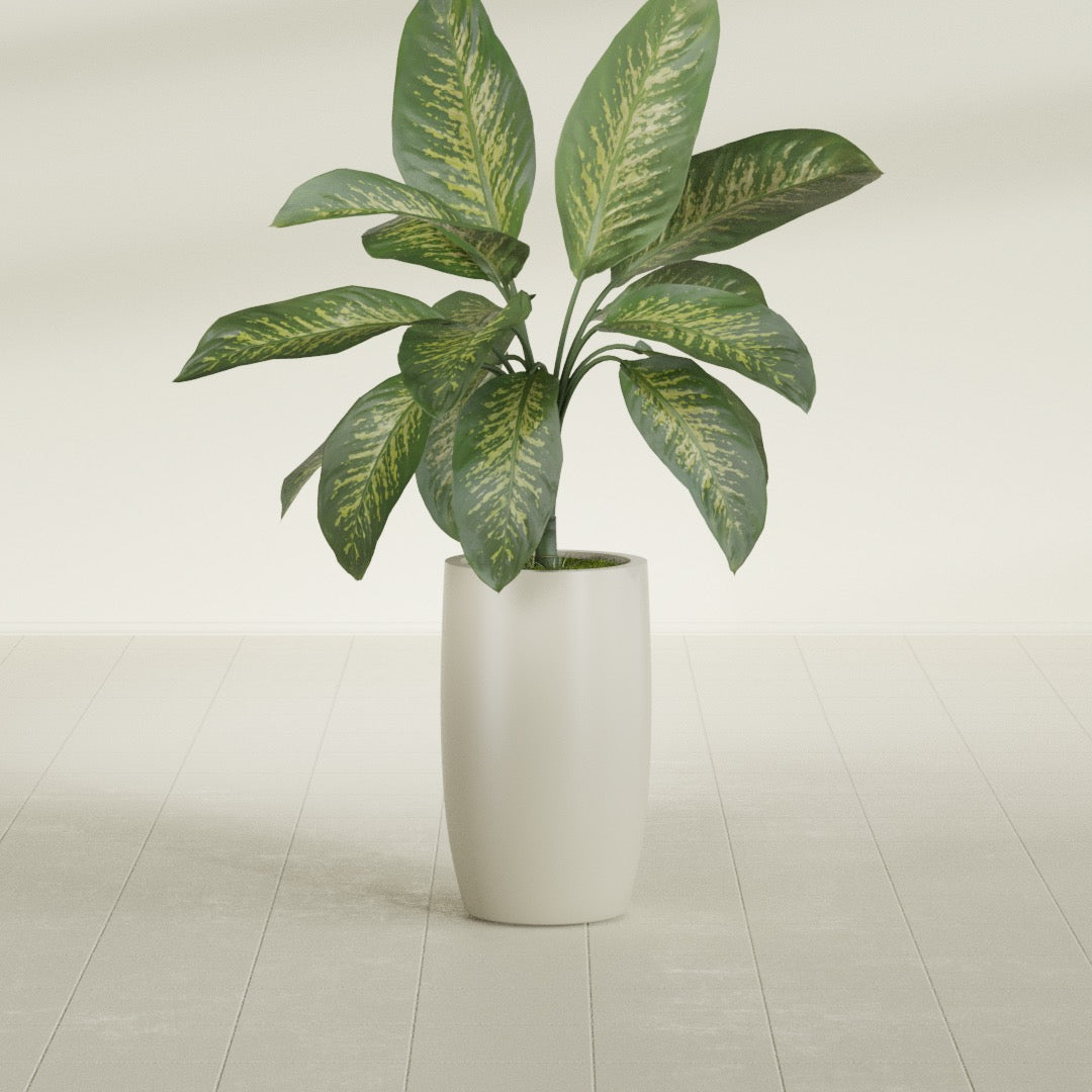 Lisbon Tall Round fiberglass planter in Satin Beige, shown planted, in a sunlit interior