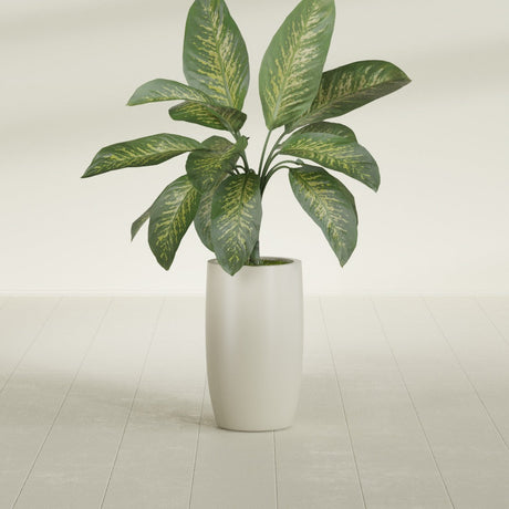 Lisbon Tall Round fiberglass planter in Satin Beige, shown planted, in a sunlit interior