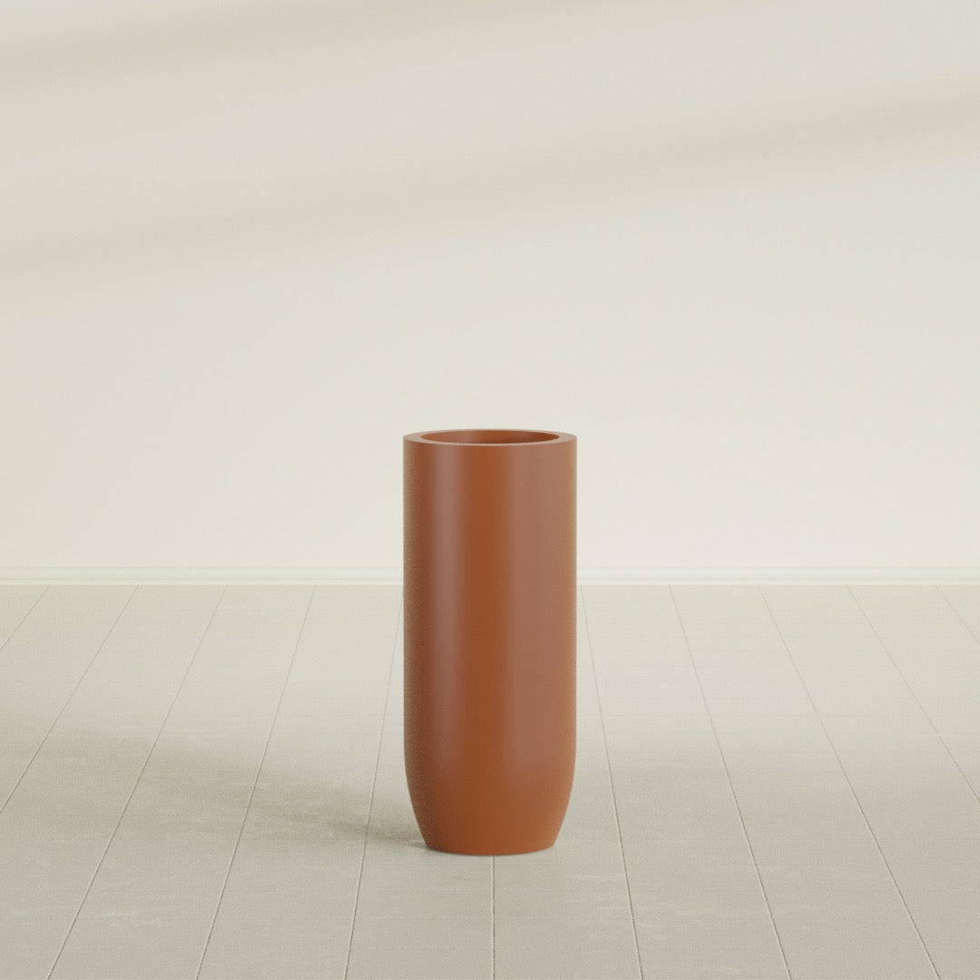Saint Tropez Bullet Round Planter in Matte Terra Cotta, 16"D × 38"H, shown empty