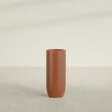 Saint Tropez Bullet Round Planter in Matte Terra Cotta, 16"D × 38"H, shown empty
